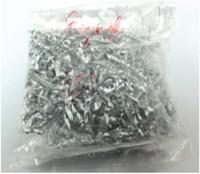 A plastic bag of silver shavings

Description automatically generated